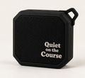 Quiet on the Course Bluetooth speaker in black with white halftone lettering, front view